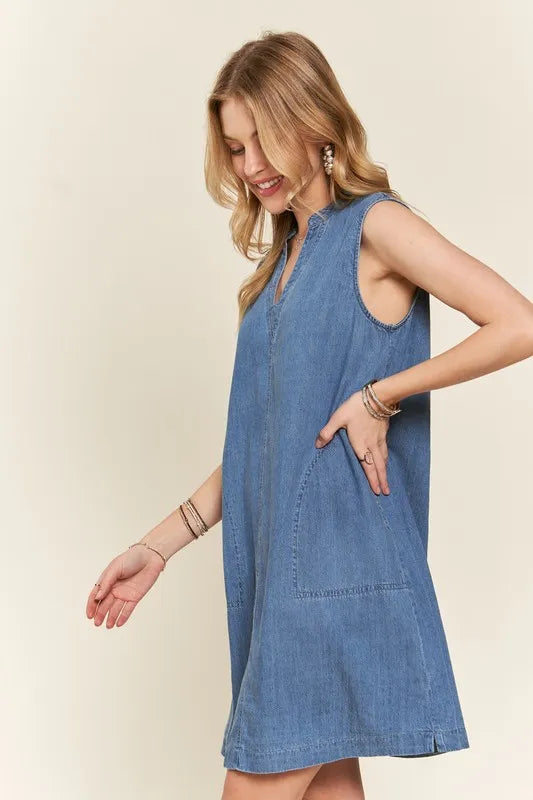 ADORA notched sleeveless blue denim dress with v-neckline and pockets
