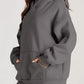 Cozy oversized gray kangaroo pocket long sleeve hoodie with soft fleece texture