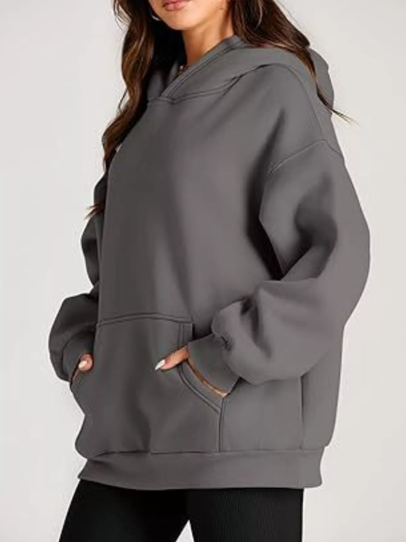 Cozy oversized gray kangaroo pocket long sleeve hoodie with soft fleece texture