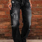 Distressed loose fit jeans in dark-wash denim with rips and frayed hems