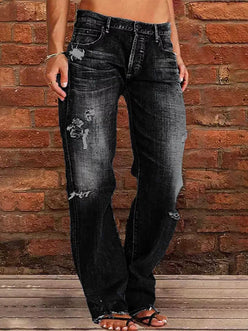 Distressed loose fit jeans in dark-wash denim with rips and frayed hems