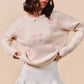 Cream-colored SO ME knit sweater with pink embroidered bows