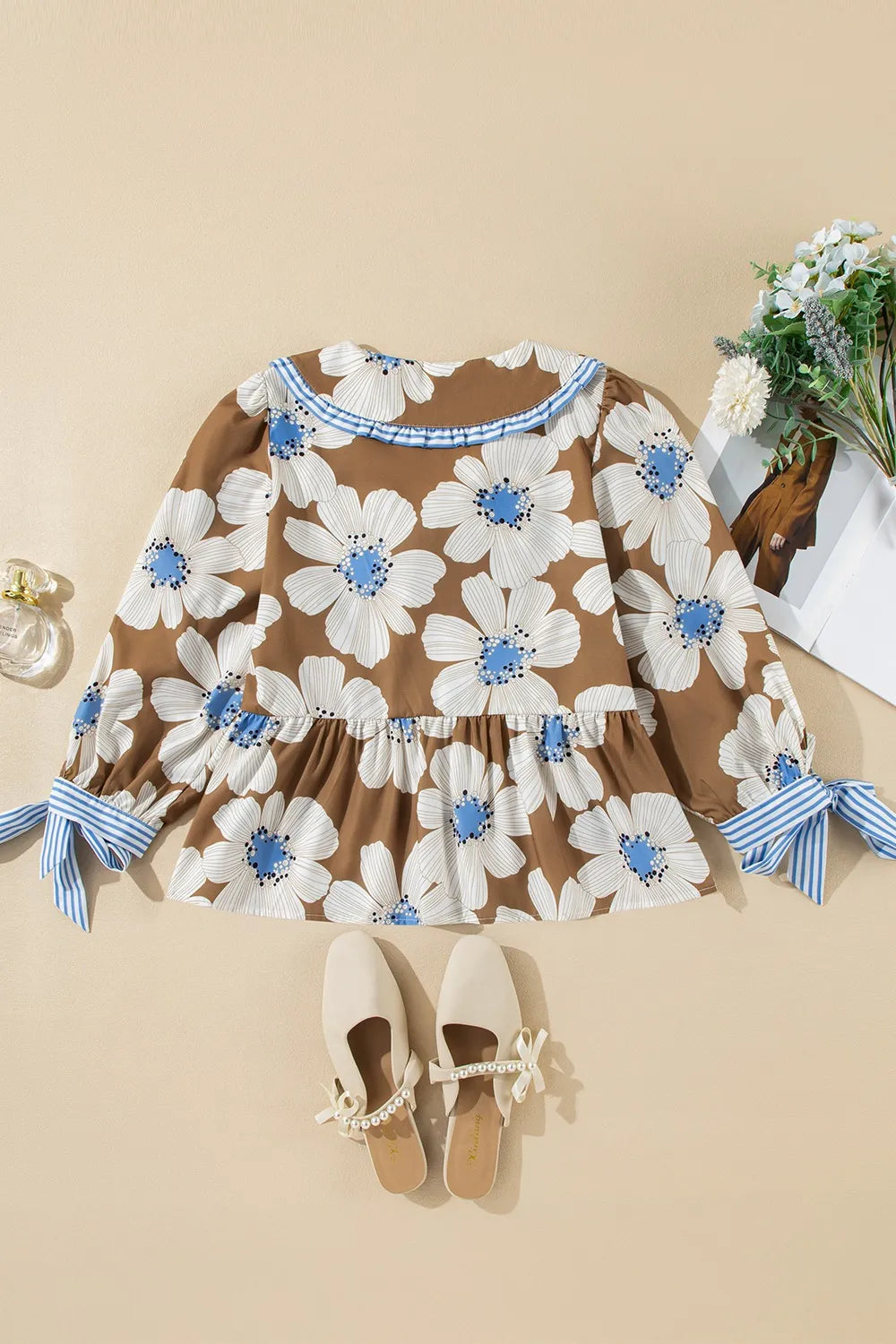 Brown long-sleeved floral print blouse with striped tie cuffs