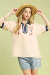 Umgee embroidered puff sleeve top in beige with navy contrast trim