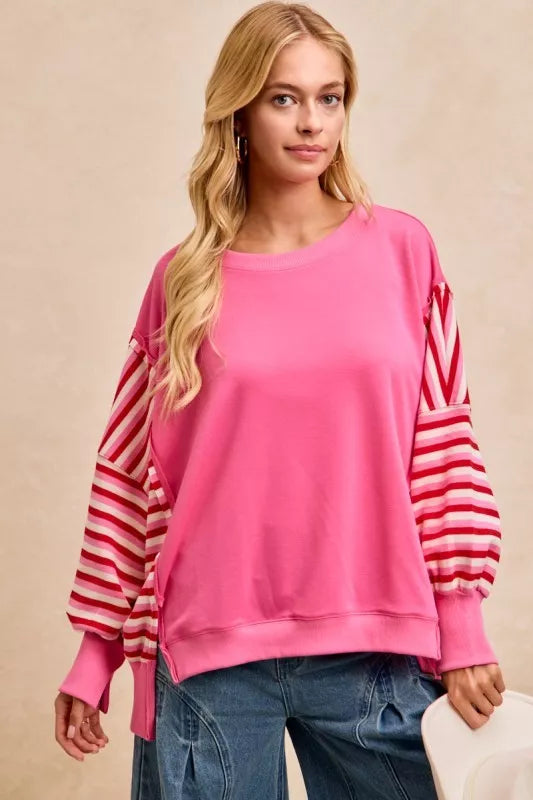 Pink BiBi French terry sweatshirt with red white striped sleeves