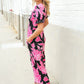 Spring Vibes Black Floral Print Ruffle Sleeve Wide Leg Jumpsuit - DAVERRI FASHIONS