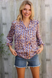 On A Wild Streak V Neck Fabric Button Detail Blouse | Daverri Fashions