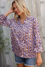 On A Wild Streak V Neck Fabric Button Detail Blouse | Daverri Fashions