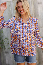 On A Wild Streak V Neck Fabric Button Detail Blouse | Daverri Fashions