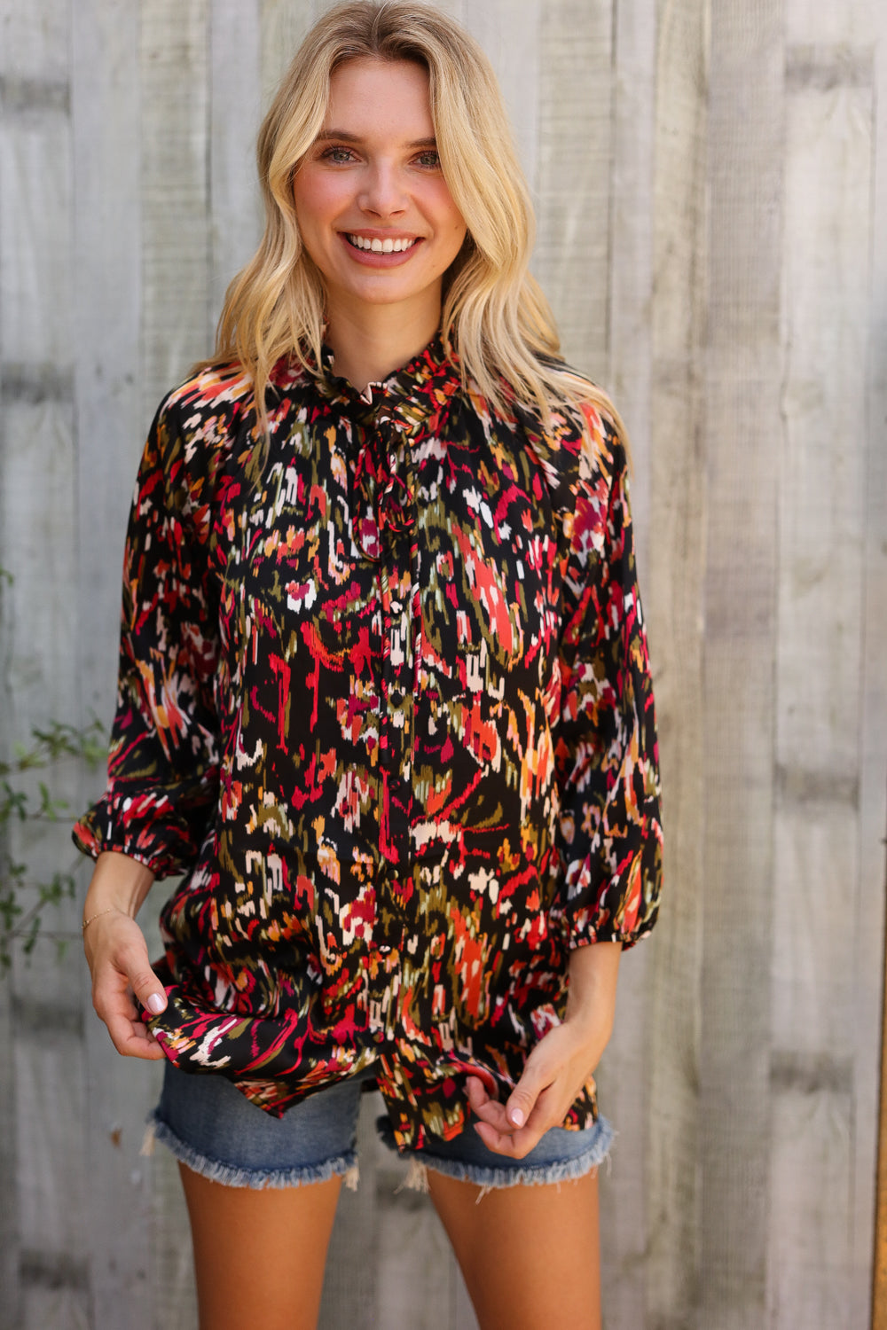 Vibrant Evening Sunset Scribble Button Down Blouse with bold floral pattern