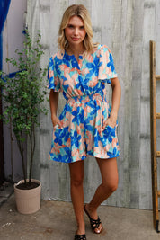 Feeling Bold Turquoise Floral Smocked Waist Flutter Sleeve Romper | Daverri Fashions