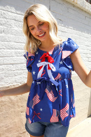 American Flag Blue & Red Stars & Bow Print Woven Top | Daverri Fashions