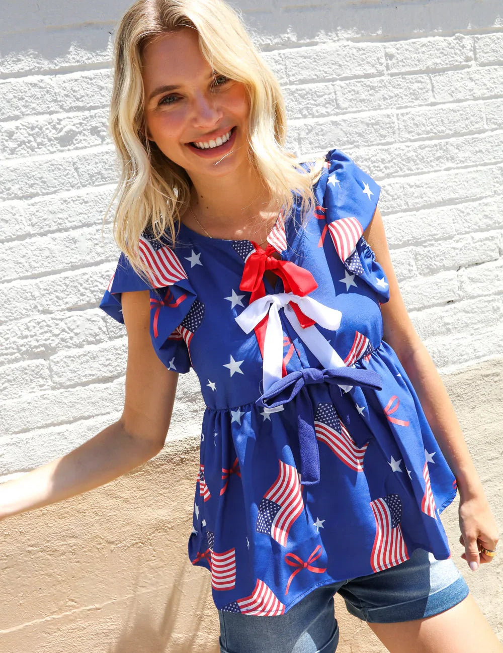 American Flag Blue & Red Stars & Bow Print Woven Top | Daverri Fashions