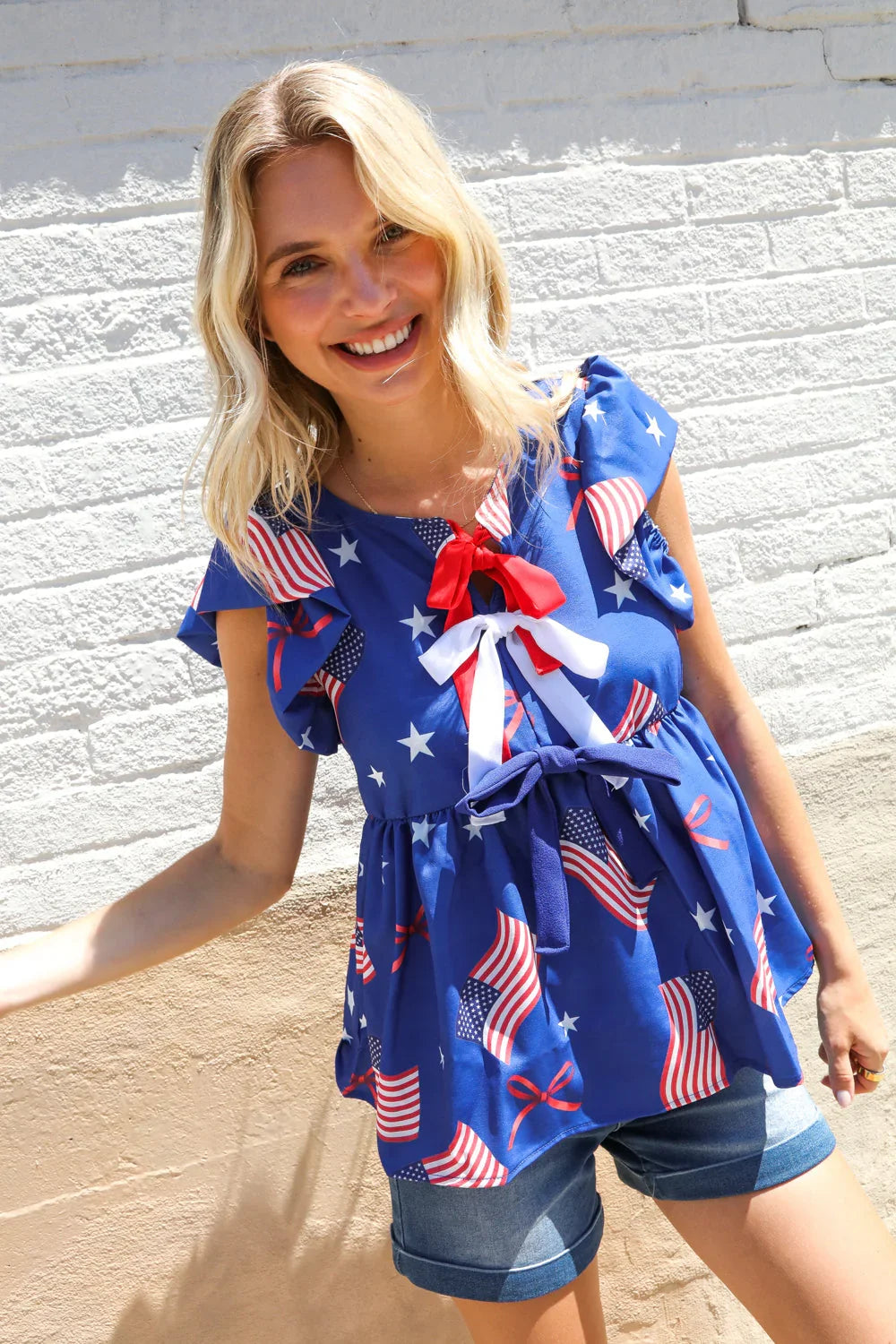 American Flag Blue & Red Stars & Bow Print Woven Top | Daverri Fashions