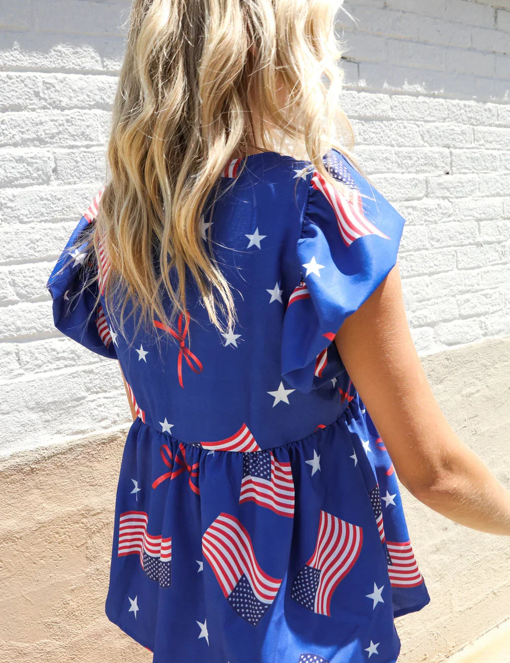 American Flag Blue & Red Stars & Bow Print Woven Top | Daverri Fashions