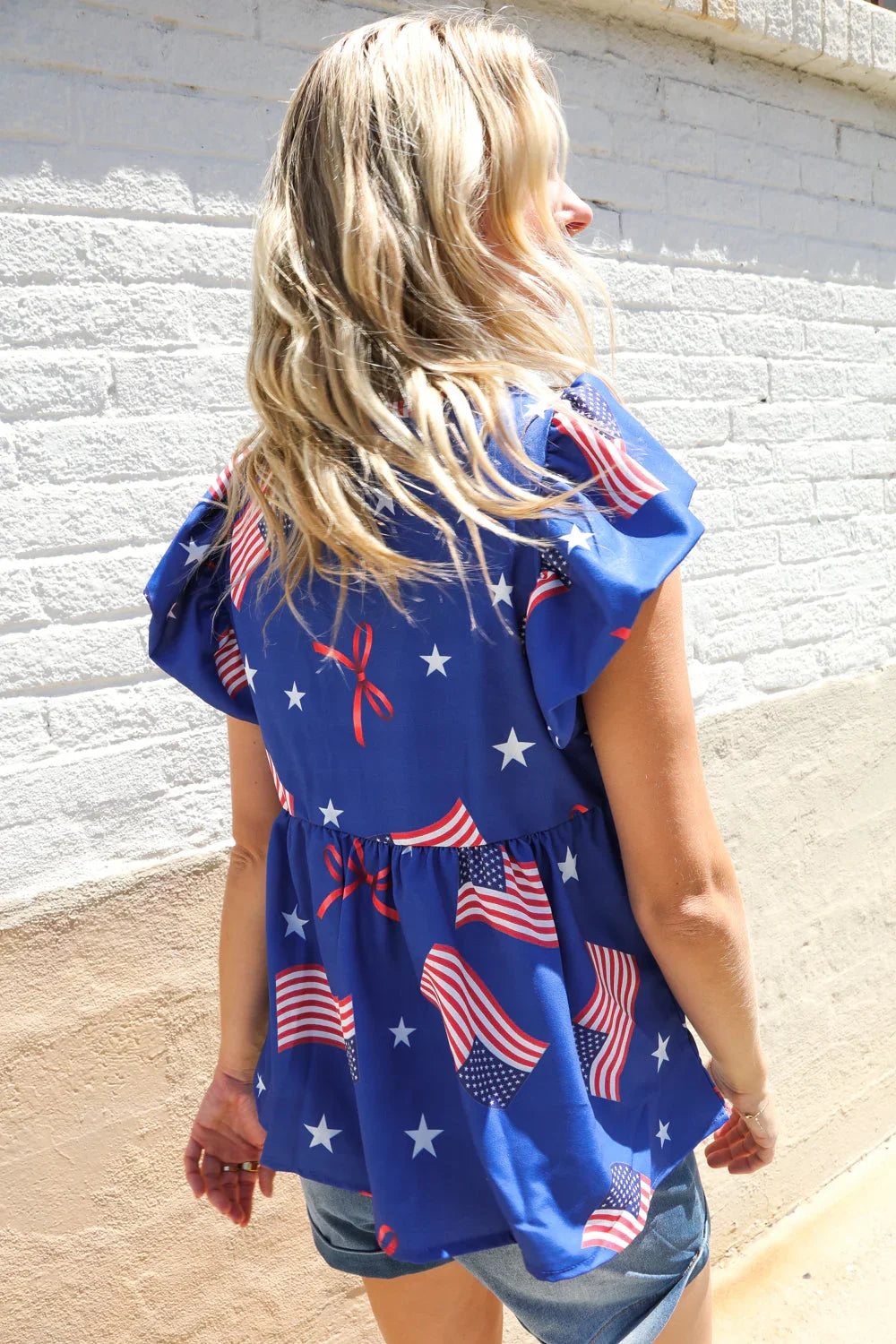 American Flag Blue & Red Stars & Bow Print Woven Top | Daverri Fashions