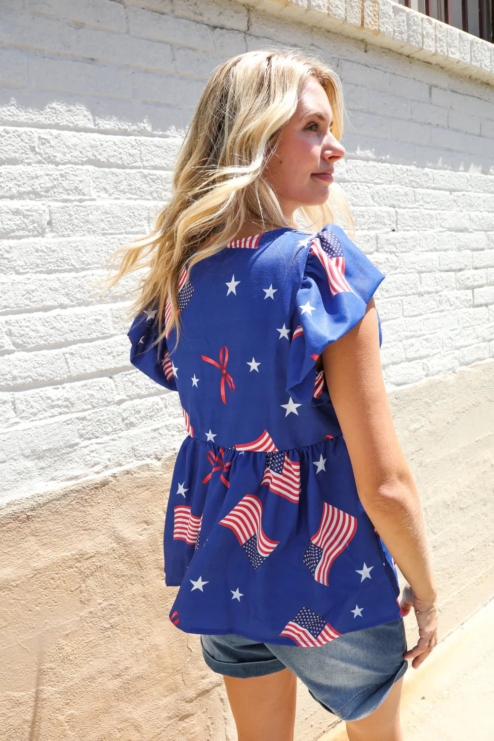 American Flag Blue & Red Stars & Bow Print Woven Top | Daverri Fashions