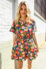 Sunny Days Floral Print Smocked Waist Back Neck Button Romper | Daverri Fashions