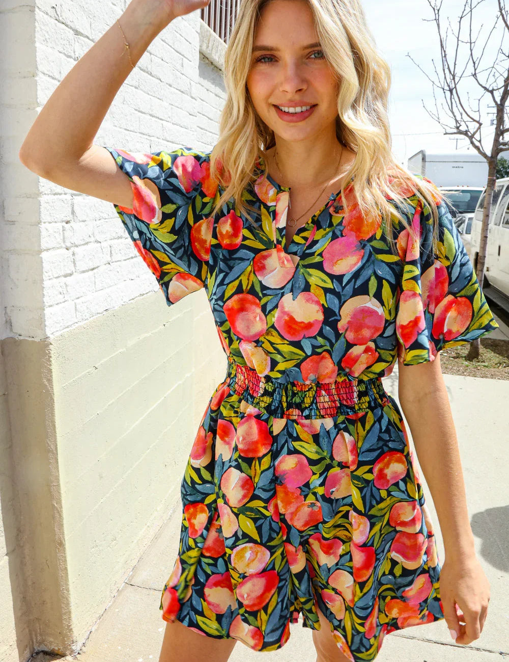 Sunny Days Floral Print Smocked Waist Back Neck Button Romper | Daverri Fashions