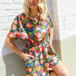 Sunny Days Floral Print Smocked Waist Back Neck Button Romper - DAVERRI FASHIONS