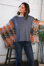 In A Paisley Daydream French Terry Poncho Top | Daverri Fashions