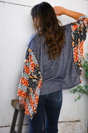In A Paisley Daydream French Terry Poncho Top | Daverri Fashions