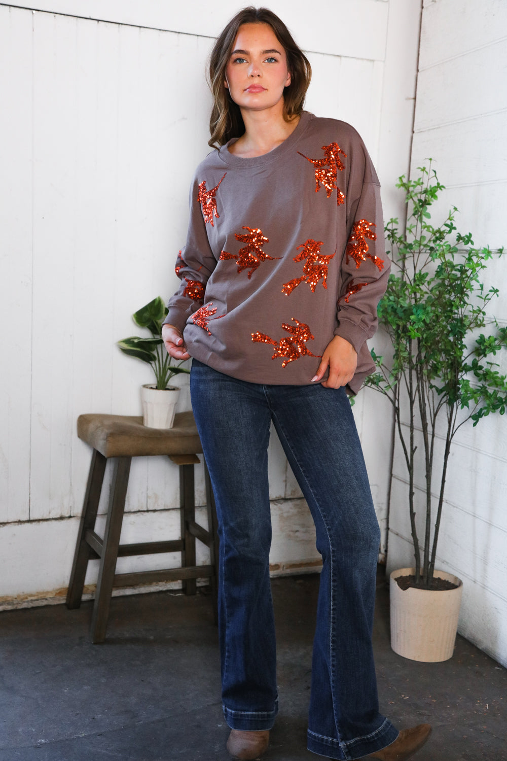 Cozy taupe Sequins and Spells Spooky Pullover with orange sequin butterflies