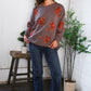 Taupe Sequins and Spells Spooky Pullover with orange sequin florals