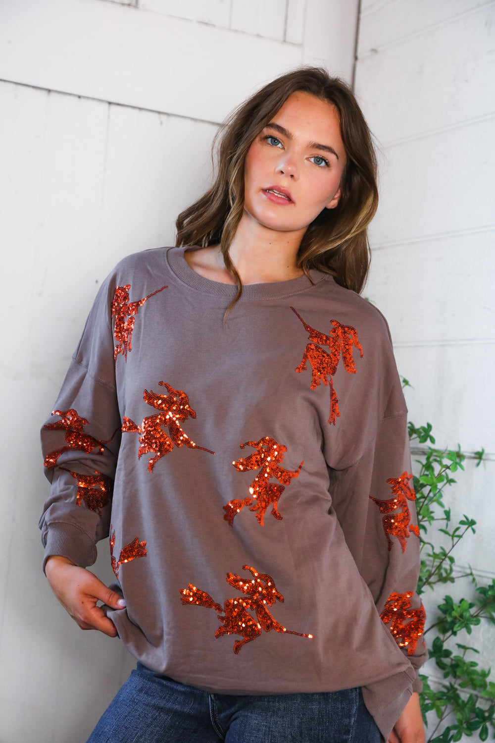 Cozy gray Sequins and Spells Spooky Pullover with orange sequin unicorns