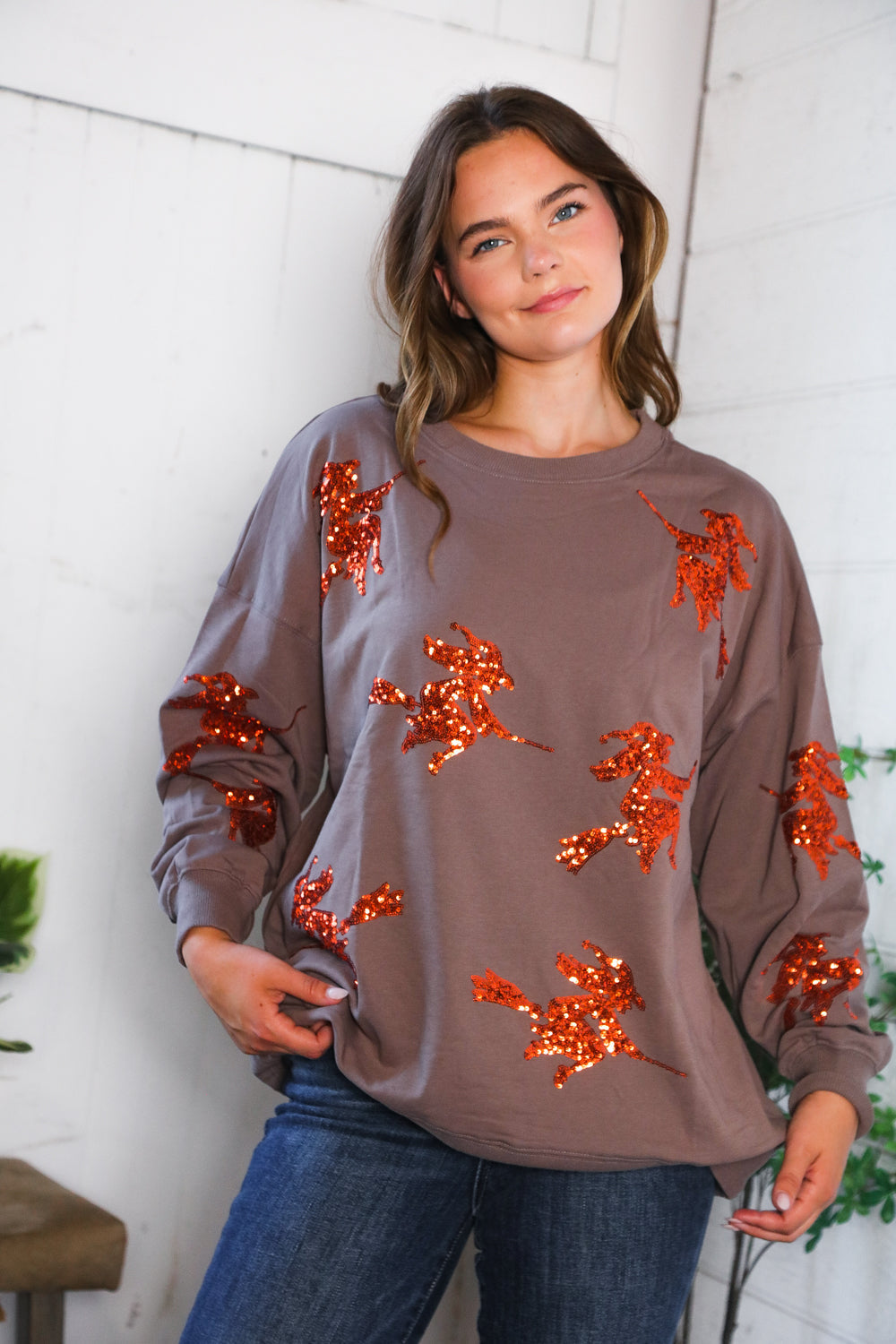 Cozy taupe Sequins and Spells Spooky Pullover with orange sequin leaves