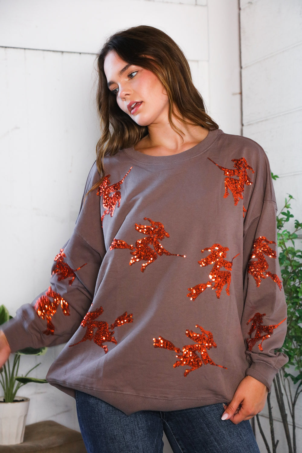 Cozy taupe Sequins and Spells Spooky Pullover with orange sequined foxes