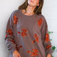 Cozy taupe Sequins and Spells Spooky Pullover with orange sequin witch silhouettes