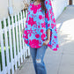 Follow Me Fuchsia Floral asymmetrical coverup blouse in vibrant blue with pink patterns