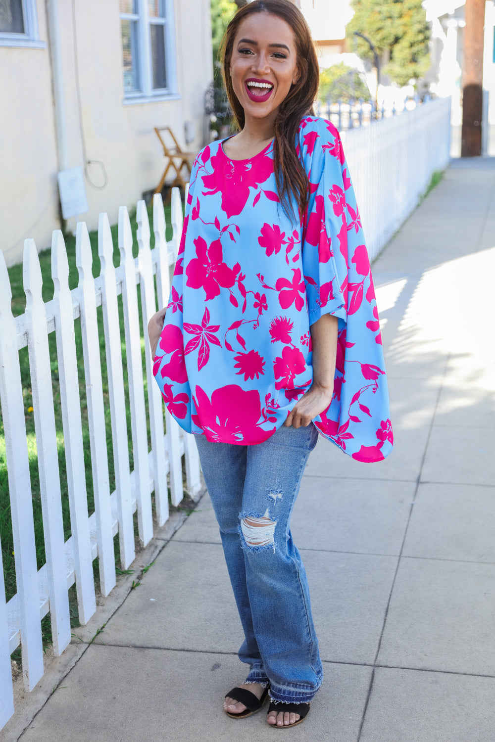 Follow Me Fuchsia Floral asymmetrical coverup blouse in vibrant blue with pink patterns