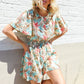 Get Whimsical Tropical Print Smocked Waist Neck Button Romper - DAVERRI FASHIONS