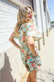 Get Whimsical Tropical Print Smocked Waist Neck Button Romper | Daverri Fashions