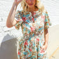 Get Whimsical Tropical Print Smocked Waist Neck Button Romper - DAVERRI FASHIONS