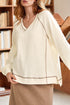 Beige exposed seam textured knit V-neck pullover sweater