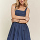 ADORA smocked back square neck denim dress with flared ruffled hem
