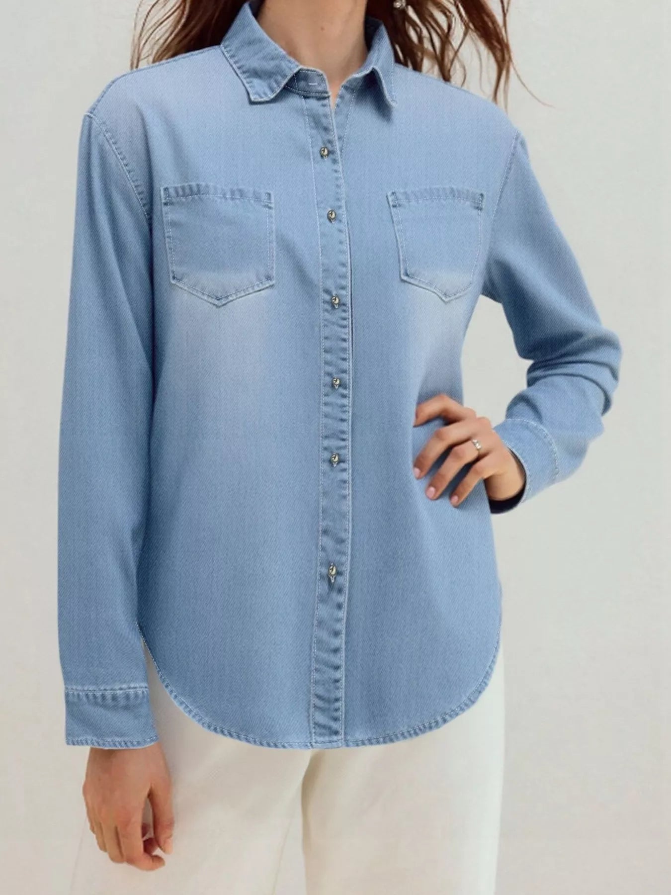 Light blue Daverri Fashions plus size button-up long sleeve denim shirt with chest pockets