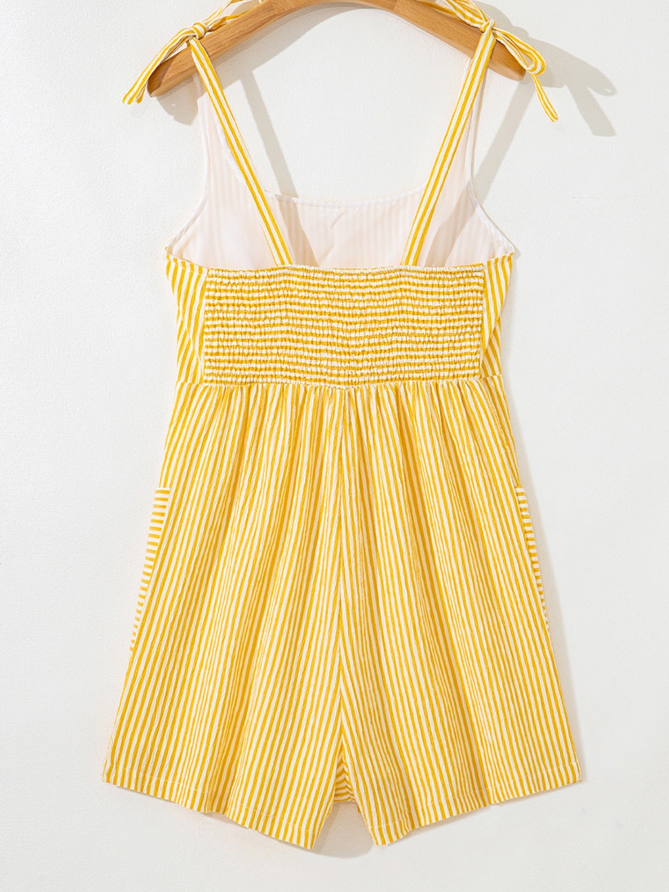 Daverri striped tie-shoulder romper in yellow and white stripes