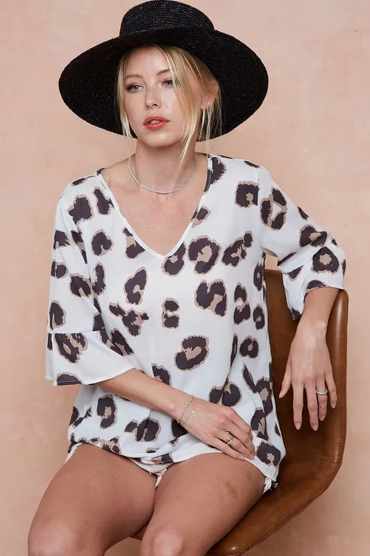 BiBi Leopard Printed V Neck Woven Top with Ruffled | Blouses Daverri Fashions