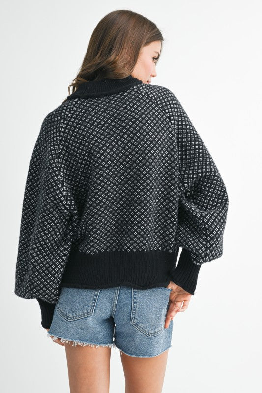 Black Aemi + Co Echo loose fit knit cardigan with white geometric pattern