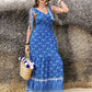 Vibrant printed V-neck tie shoulder bohemian maxi dress with floral paisley patterns