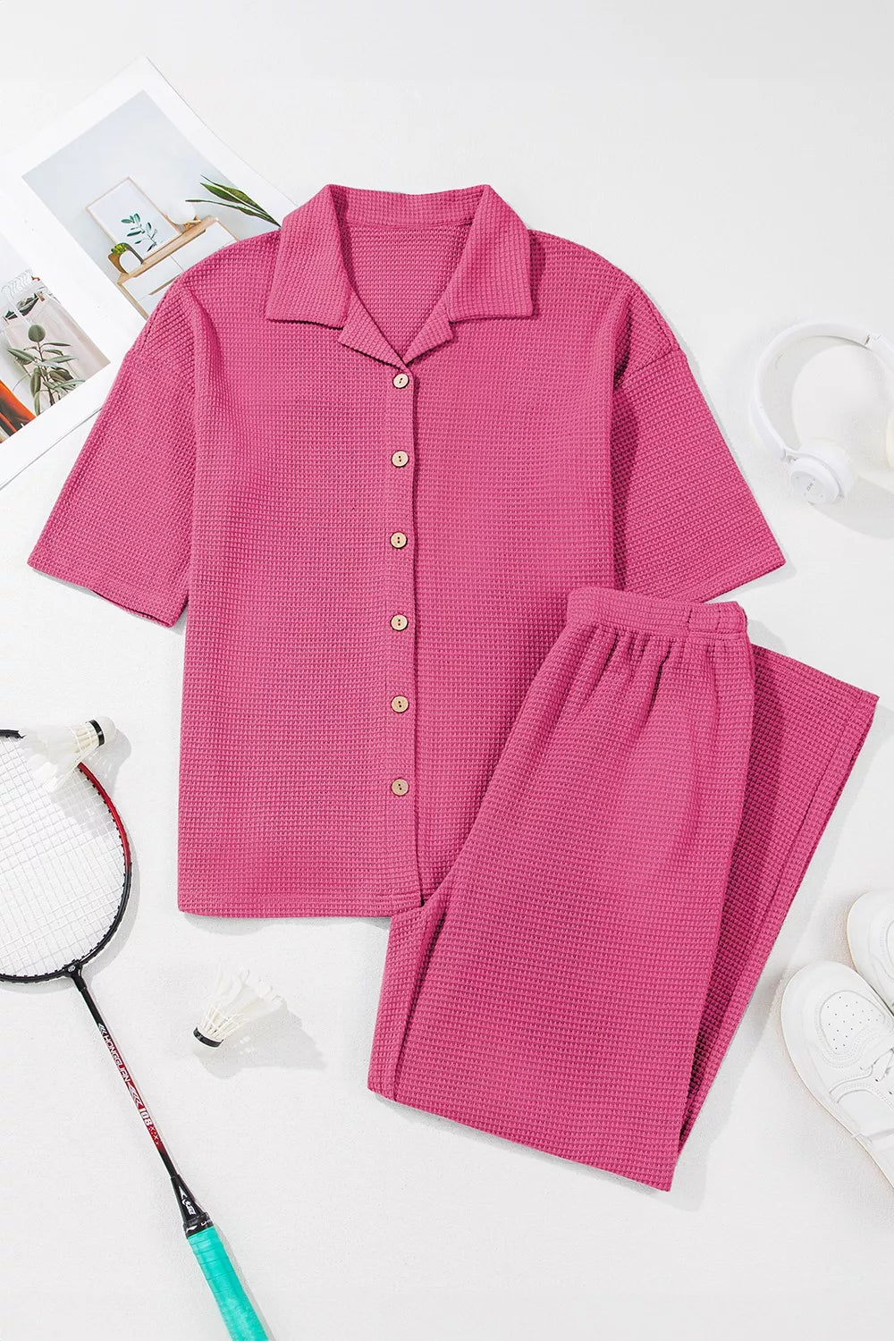 Pink waffle-knit pajama set with short sleeve button-front shirt and pants