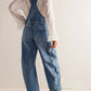 Wide strap wide leg denim overalls in blue with relaxed fit and pockets