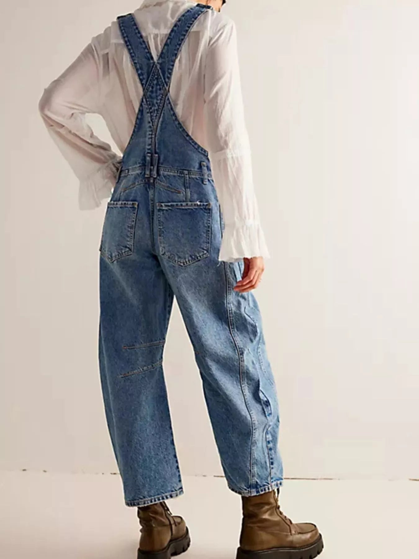 Wide strap wide leg denim overalls in blue with relaxed fit and pockets