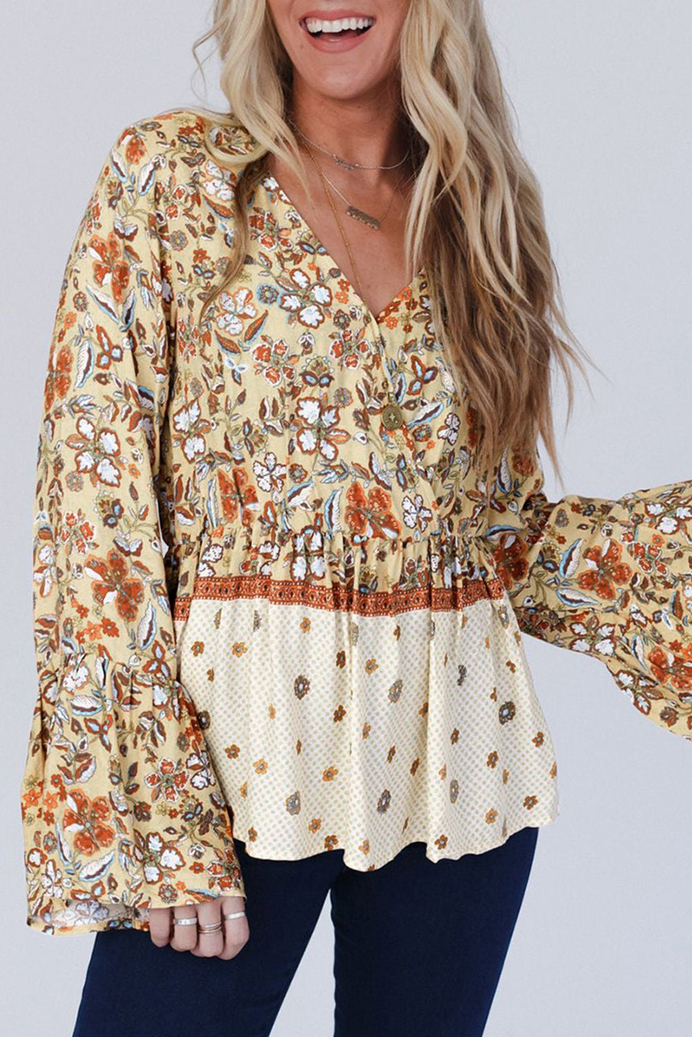 Women’s yellow printed floral bell sleeve V-neck peplum blouse