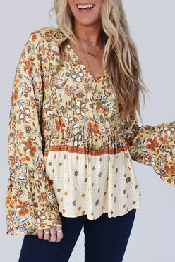 Women’s yellow printed floral bell sleeve V-neck peplum blouse