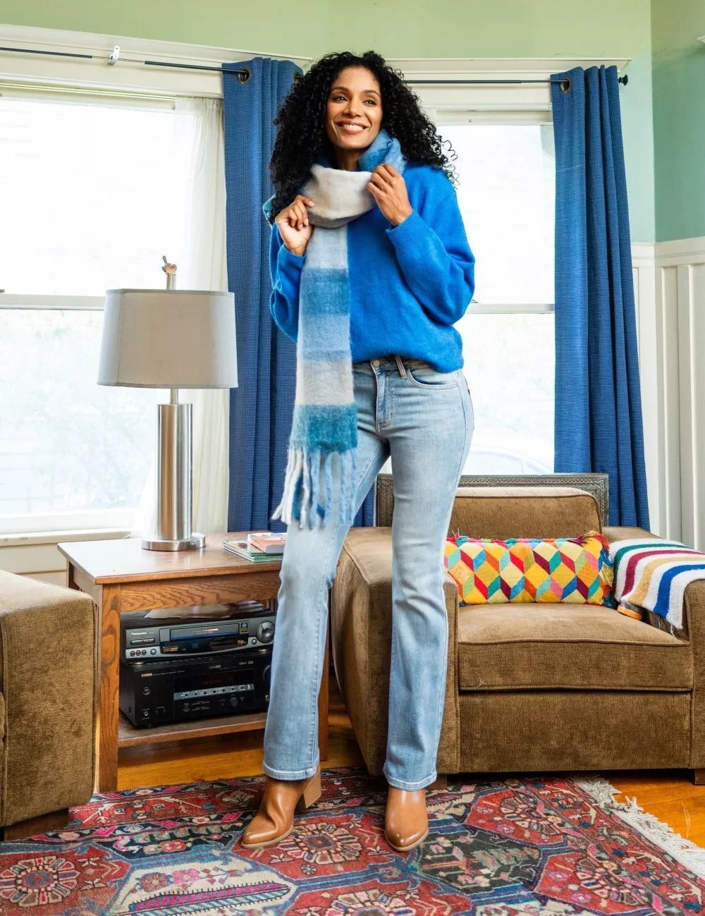Judy Blue Mid Rise Thermal Bootcut Jeans with blue sweater and striped scarf